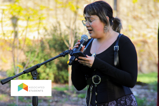 Student singing at open mic