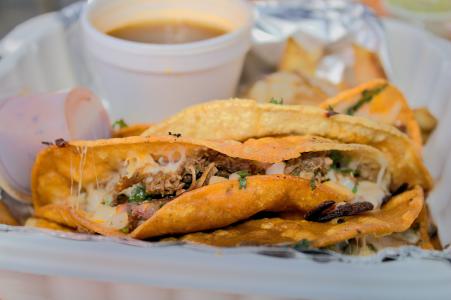 Birria taco with consome